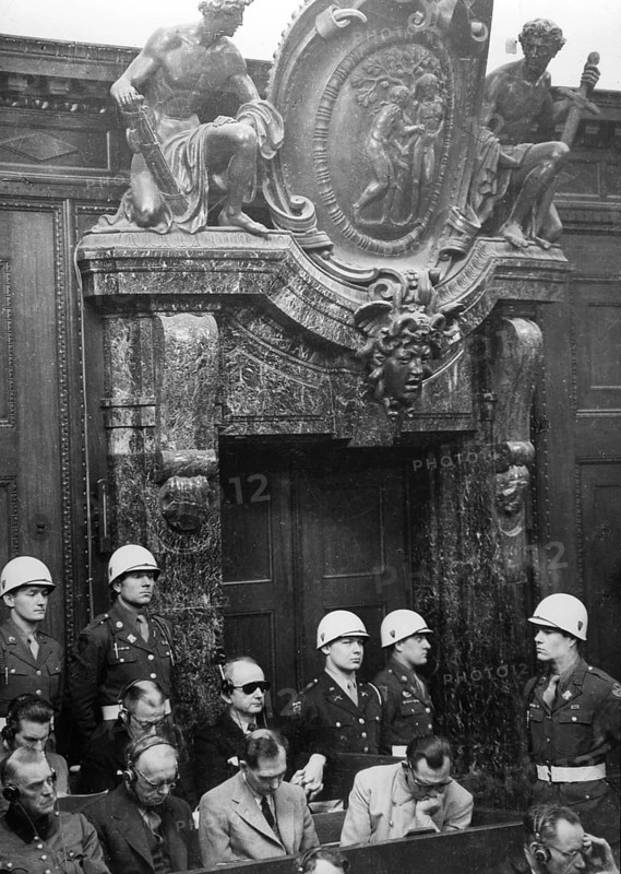 Nuremberg Trials, major war criminals, dock, Nuremberg 1946 J. Chaldej: This is an extraordinary photo for me because it touches me emotionally. Here are the greatest war criminals sitting in the dock. It was during the interrogation of Field Marshal Paulus, who had been captured in Stalingrad. Göring, Hess, Ribbentrop and Keitel were sitting here, along with Admiral Dönitz and von Schirach