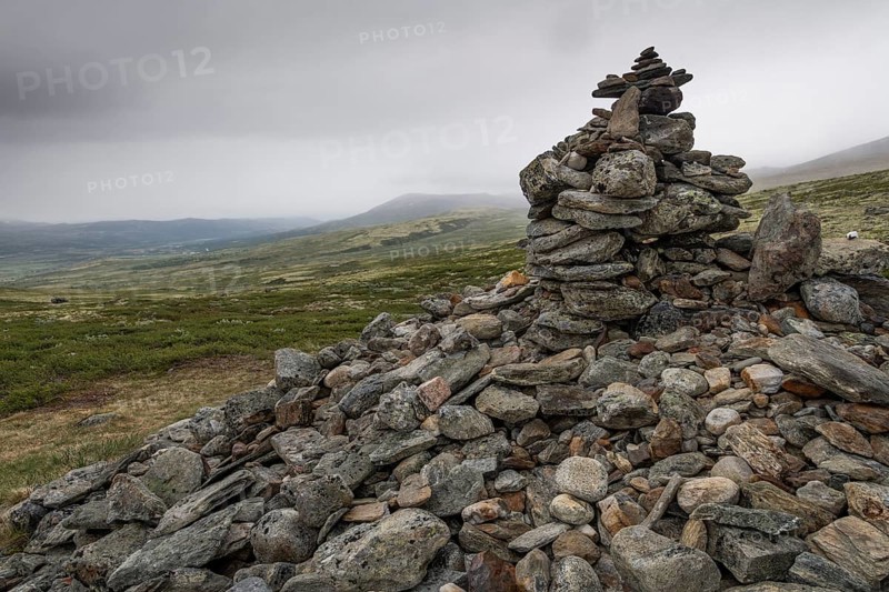 Stones deposited by pilgrims, stone pyramid, Allmannrøysa, Olav's Way or Olavsleden, old Kongevegen or King's Path over Dovrefjell, Norway