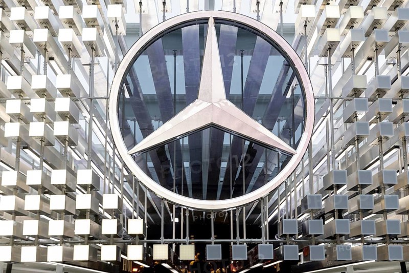 Munich, Germany - 10.9.2025: A large Mercedes star, logo of the German car manufacturer Mercedes-Benz, stands at the entrance to the Mercedes-Benz stand during the IAA Open Space at the IAA Mobility 2025 (International Motor Show) in Munich