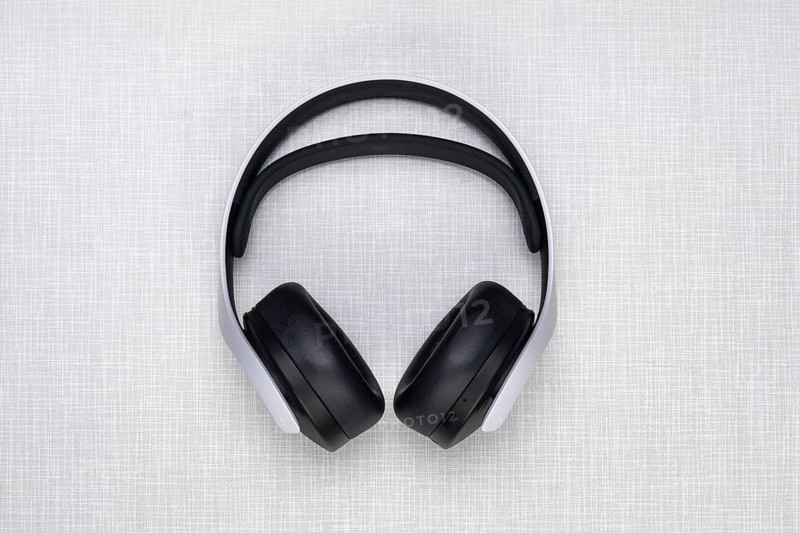 Top shot of a Playstation 5 headphone on a white Resopal plate