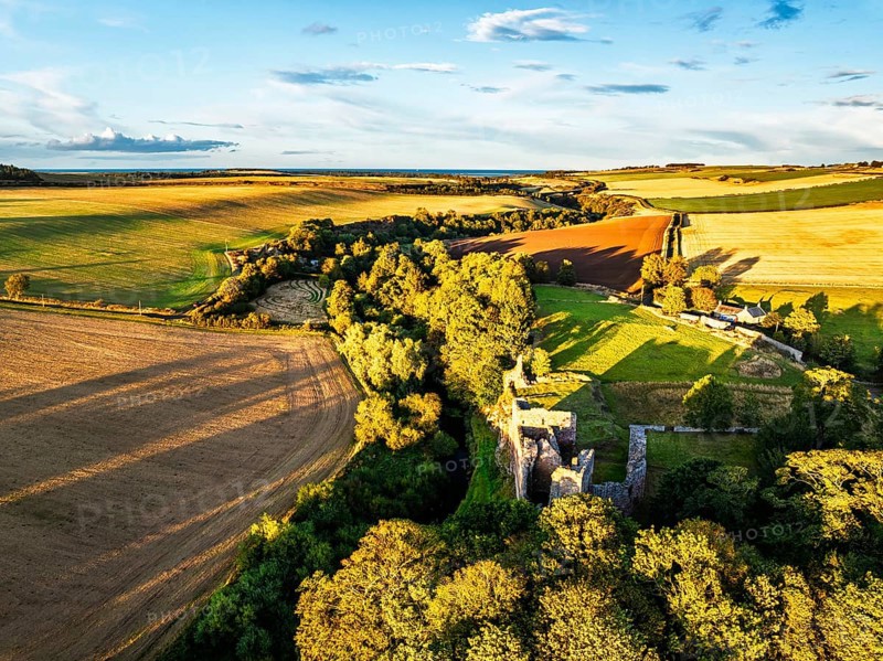 Ruins of Hailes Castle over River Tyne from a drone, East Linton, East Lothian, Scotland, UK
