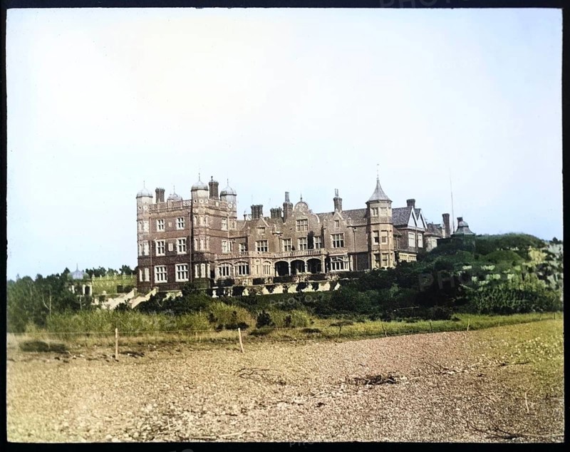 Colourised magic lantern slide of Bawdsey Manor from the beach, Suffolk, England, UK c 1910
