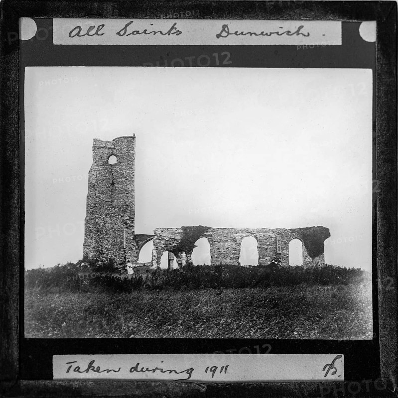 Magic lantern slide of ruin of All Saints church on clifftop at Dunwich, Suffolk, England, UK 1911