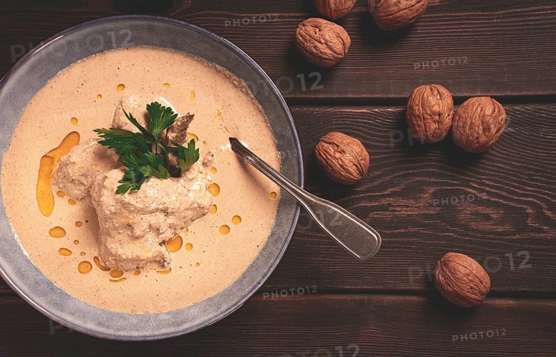 Satsivi, Georgian dish, chicken in nut sauce, cold appetizer, rustic, no people, homemade