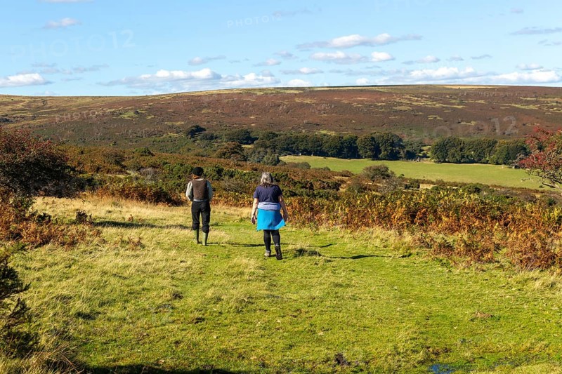 Two women, mother and daughter, walking on moorland in autumn, near Hayford, Buckfastleigh, Dartmoor national park, Devon, England, UK