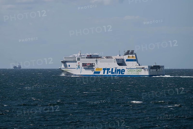LNG-powered TT-Line ferry travelling across a gently moving blue sea, near Warnemünde, Rostock, Mecklenburg-Vorpommern, Germany
