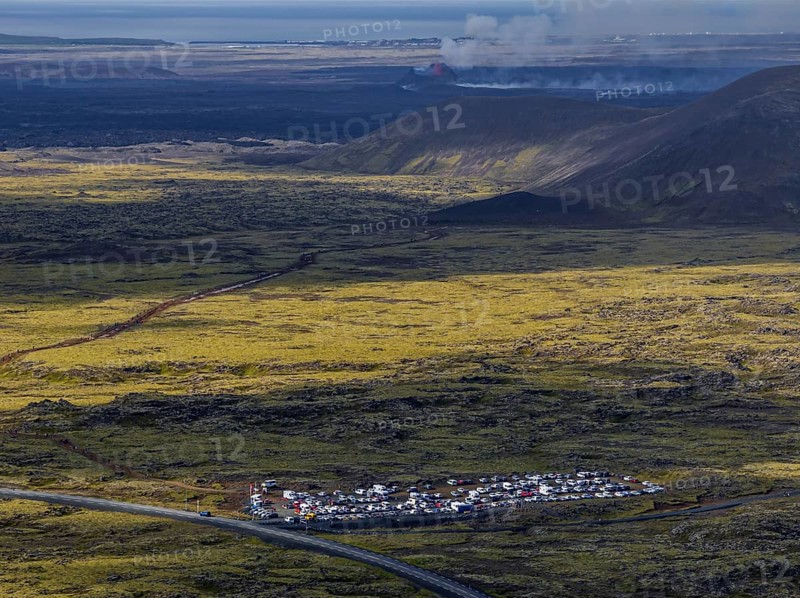 Lava, lava field, summer, cloudy, sunny, volcanic eruption, aerial view, tourists, car park, July 2025, Grindavik, Sundhnúkur crater series, Fagradalsfjall, Reykjanes, Iceland