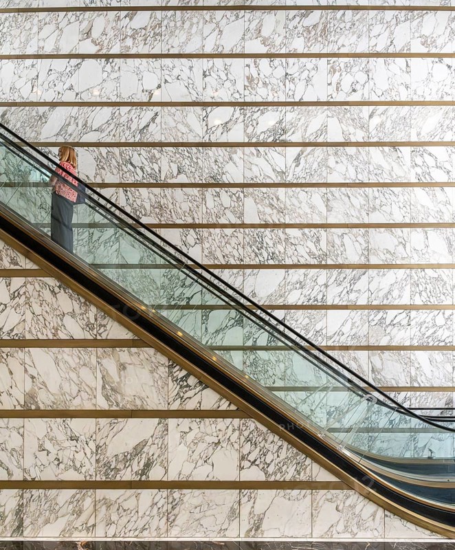 Escalator in the foyer of the Meoclinic, private practices in Friedrichstraße, Berlin, Germany