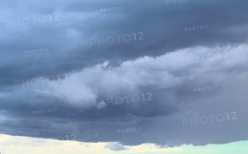 Gathering low pressure area with rain front dark stratus clouds Nimbostratus clouds, international
