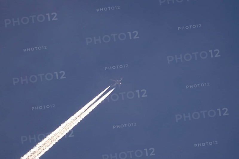 Blue sky with vapour trails, Germany