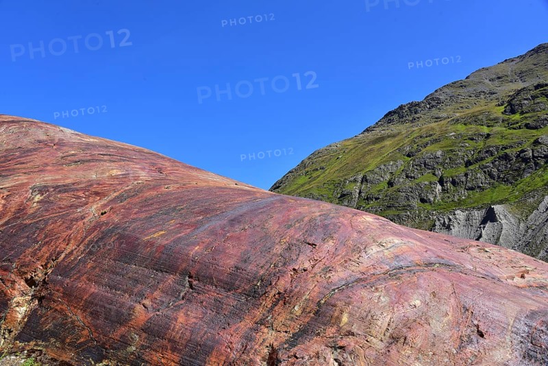 Hiking area below the Gepatsch Glacier in the Kaunertal with red rocks bearing traces of glacier ice, Kaunertal, Ötztal Alps, Tyrol, Austria