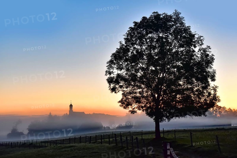 Sunrise at the pilgrimage church of the Visitation of the Virgin Mary in Ilgen im Allgäu, Bavaria, Germany