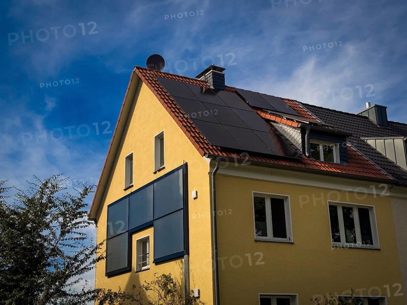 Solar panels on the roof and façade of an apartment block in Wuppertal, Germany