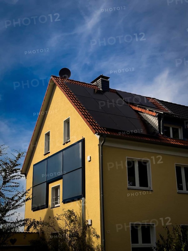 Solar panels on the roof and façade of an apartment block in Wuppertal, Germany