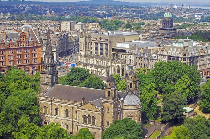 View of a cityscape with impressive architecture and lots of greenery, view from Edinburgh Castle, New Town, Edinburgh, Scotland, United Kingdom