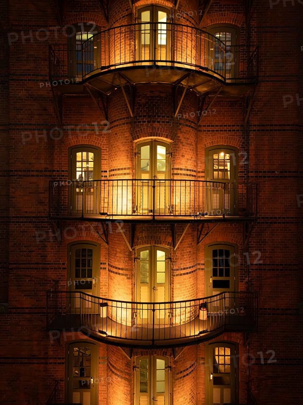 Hamburg warehouse district with evening lighting, Hamburg, Germany
