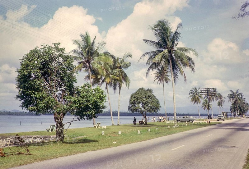 Thought to be road running along coast at Lido beach, Johor Bahru, Malaya, Malaysia, south east Asia, c 1964
