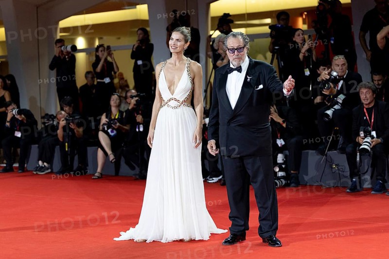 Venice, Italy - 3 September 2025: Louise Kugelberg and Julian Schnabel during the Red Carpet of - Cartier Glory To The Filmmaker Award 2025 and In the Hand of Dante - during the 82nd Venice International Film Festival