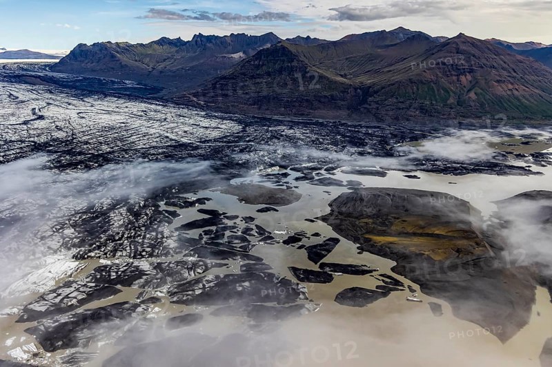 Icebergs, ice floes, glacier tongue, glacier edge, glacier, lake, glacier lagoon, aerial view, black ice, climate change, summer, mountains, Skeidararjökull, Skaftafell, Vatnajökull National Park, Iceland