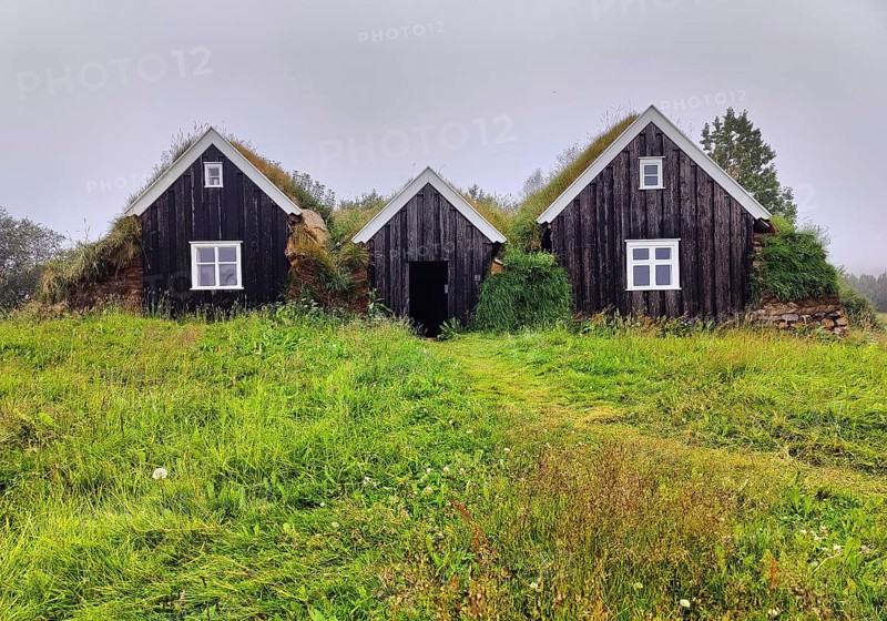 Nyibær, a medium-sized farmhouse with a sod roof, now a museum, Holar, Iceland