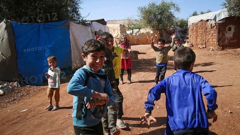 Syrian children playing in a refugee camp near the Turkish border on World Children's Day. Aleppo, Syria October 29, 2022, Aleppo, Syria