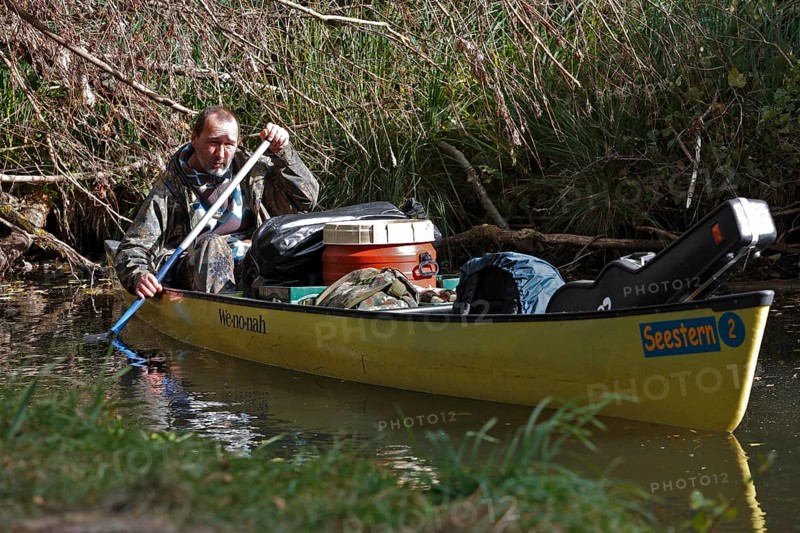 Canoeists in a canoe, Müritz National Park, Mecklenburg-Western Pomerania, Germany