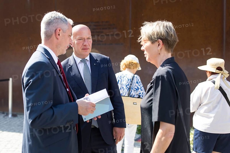 Kai Wegner (Governing Mayor of Berlin) in conversation after a wreath-laying ceremony to commemorate the division of the city from 13 August 1961 to 9 November 1989 and to remember the victims of tyranny at the Bernauer Strasse memorial, Berlin, 13.08.2025
