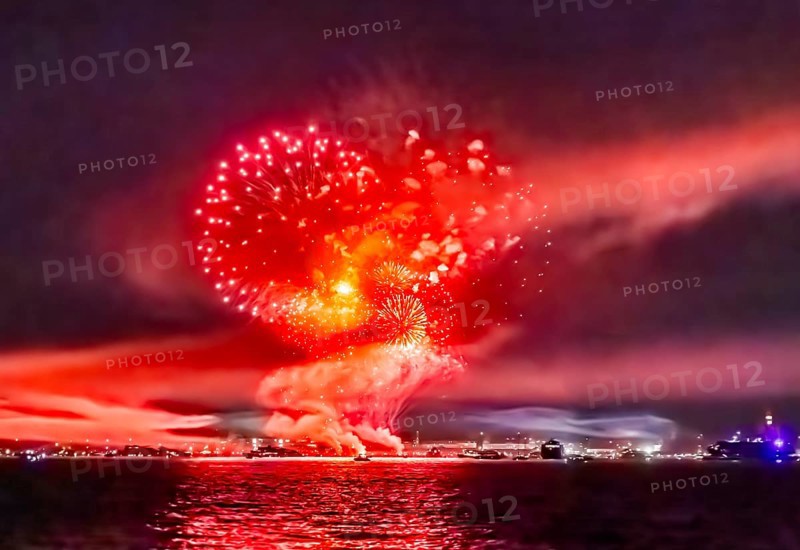 Lake Night Festival Constance. Water fireworks over the German shore and the neighbouring Swiss town of Kreuzlingen. View of the fireworks from Lake Constance. Constance, Baden-Württemberg, Germany
