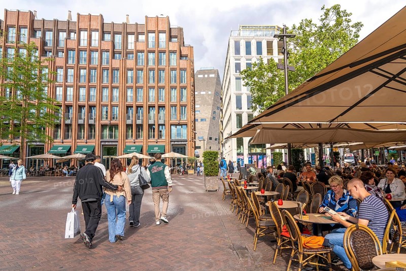The Grote Markt in the old town of Groningen, modern facades of hotel and commercial buildings, in the centre the Forum Groningen, gastronomy, Netherlands