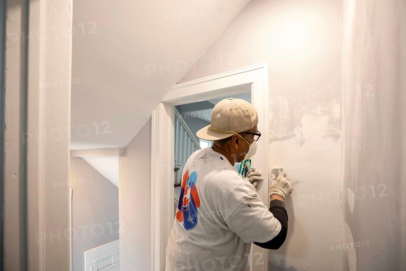 Detroit, Michigan - Workers remodel a house in the Morningside neighborhood that had been vacant for many years. Detroit lost nearly two-thirds of its residents from 1950 to 2020 but has been growing modestly in recent years