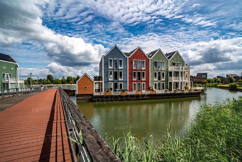 Small town of Houten near Utrecht, bicycles have priority in the town of 50, 000 inhabitants, generous cycle paths, many leisure areas, water areas, living by the water