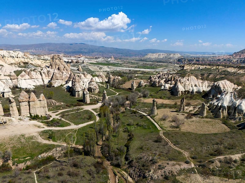 Breathtaking rock formations and valleys in Cappadocia under a blue sky, aerial view, Love Valley, Göreme National Park, Göreme Tarihî Millî Parki, Nevsehir province, Nevsehir, Cappadocia, Cappadocia, Cappadocia, Cappadocia, Central Anatolia, Turkey