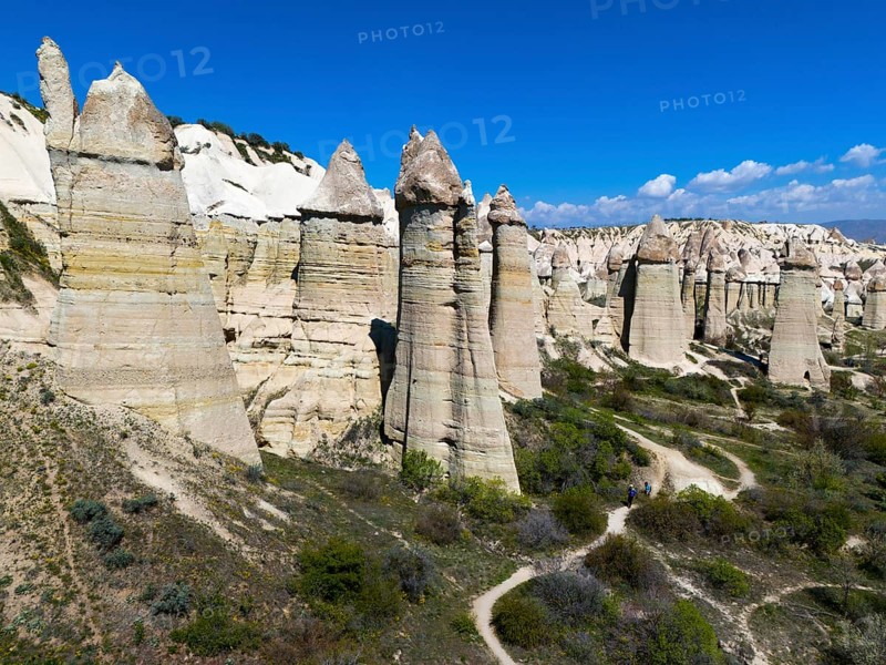 Impressive rock formations under a blue sky in Cappadocia with hiking trails, aerial view, Love Valley, Göreme National Park, Göreme Tarihî Millî Parki, Nevsehir province, Nevsehir, Cappadocia, Cappadocia, Cappadocia, Cappadocia, Central Anatolia, Turkey