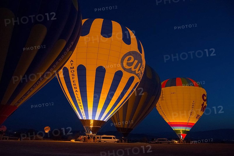 Hot air balloons at night with colourful lighting, creating a fascinating and atmospheric ambience, Göreme National Park, Göreme Tarihî Millî Parki, Nevsehir Province, Nevsehir, Cappadocia, Cappadocia, Cappadocia, Cappadocia, Central Anatolia, Turkey
