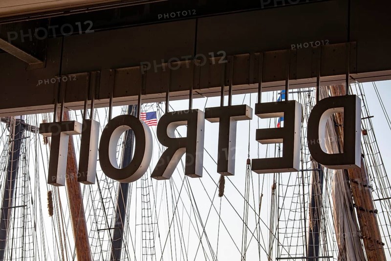Detroit, Michigan - 9 August 2025 - Four schooners visit Detroit for the Sail Detroit Festival. The rigging of the vessels is seen against a sign welcoming mariners to Detrroit