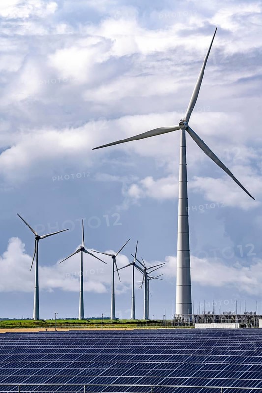 Vopak Solarpark Eemshaven, 19 hectares of solar modules with a capacity of 25 megawatts, around the Vopak tank terminal in the industrial harbour of Eemshaven, wind farm, Netherlands