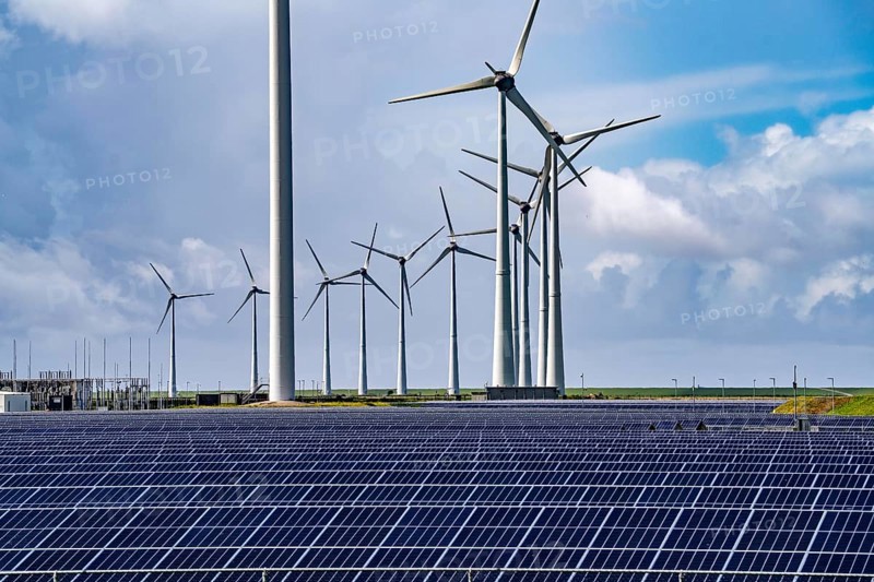 Vopak Solarpark Eemshaven, 19 hectares of solar modules with a capacity of 25 megawatts, around the Vopak tank terminal in the industrial harbour of Eemshaven, wind farm, Netherlands