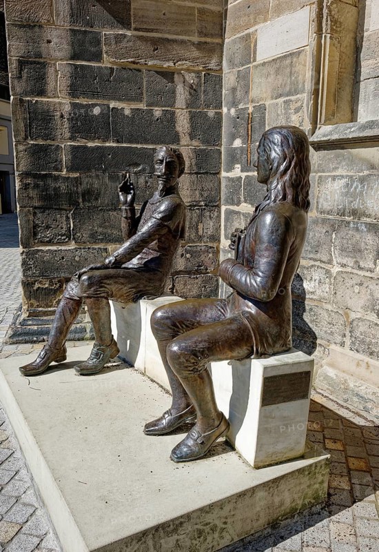 Bronze figures of Heinrich Schütz and Friedrich von Hardenberg alias Novalis by the artists Grit Bergner and Steffen Ahrens at the Protestant late Gothic St. Mary's Church, town church, market square, Weißenfels, Saxony-Anhalt, Germany