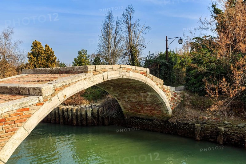 Devil's Bridge, Ponte del Diavolo, arched stone bridge over canal, Venetian arch bridge, medieval construction, landmark, Torcello Island, Venice Lagoon, Veneto, Italy