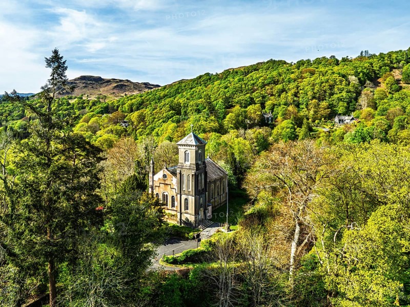 Holy Trinity Church from a drone, Bog Lane, Brathay village, Lake District, Cumbria, England, United Kingdom