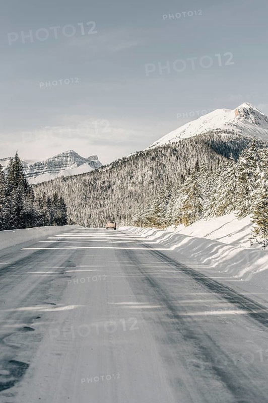 Winter road trip on the Icefields Parkway with lots of snow and ice, Banff National Park, Jasper National Park, Alberta, Canada