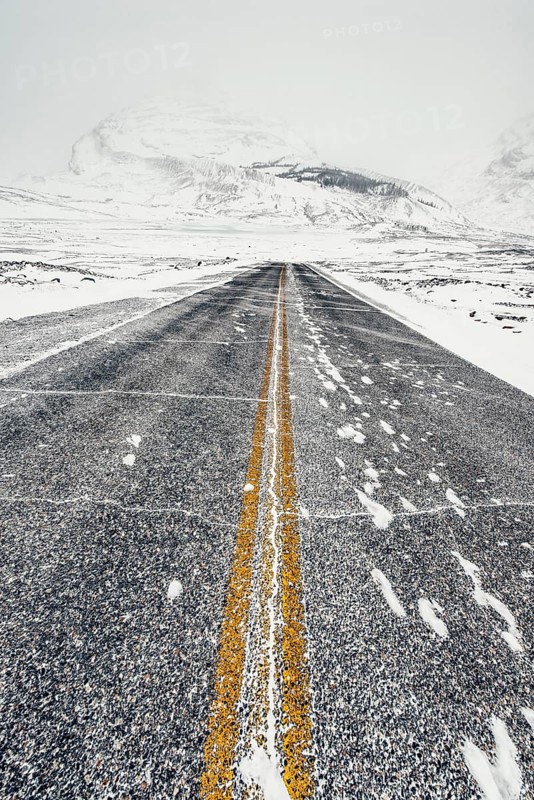 Winter road trip on the Icefields Parkway with lots of snow and ice, Banff National Park, Jasper National Park, Alberta, Canada