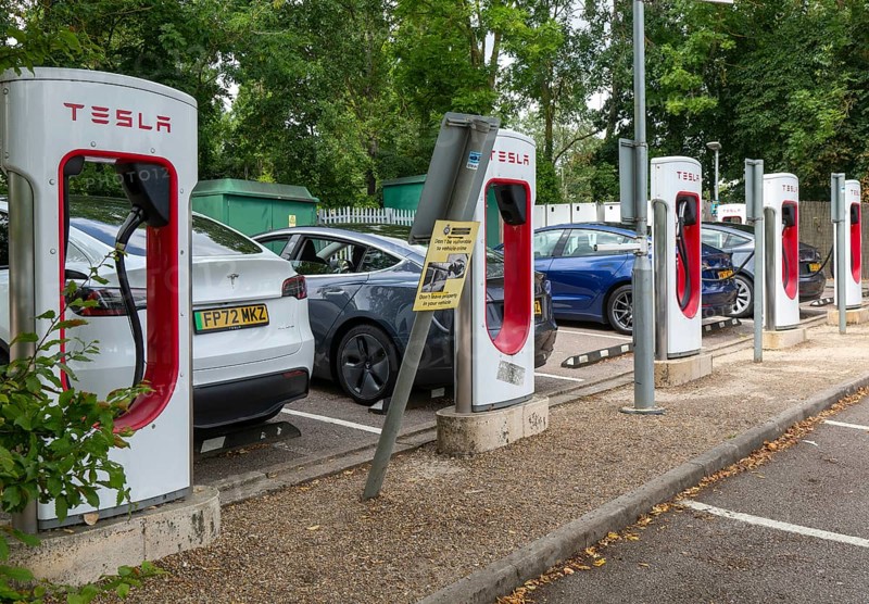 Charging point facility for Tesla electric vehicles at service station, M25 South Mimms services, Hertfordshire, England, UK