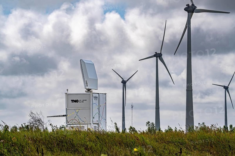 Wind farm in Eemshaven, radar system of the Dutch manufacturer Robin, bird radar, here type Robin Max Radar, detects birds and flocks of birds up to 15 km away in order to switch off wind turbines if necessary to avoid collisions and minimise damage, Netherlands