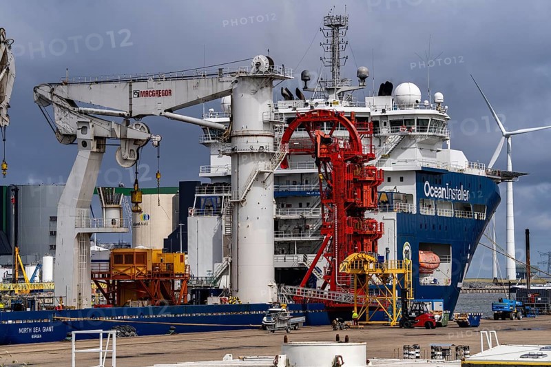 The seaport of Eemshaven, Julianahaven Basin, where the foundation structures, monopiles, for offshore wind farms are stored, which then support the actual wind turbines, the components are transported to the wind farms in the North Sea on large workboats and anchored to the seabed, where the wind turbines are then built, Eemshaven, Netherlands