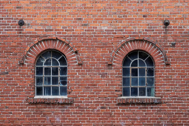 Old windows in a traditional brick wall with rustic charm and visible reflections, Stiftsmühle, Ochtrup-Langenhorst, Münsterland, North Rhine-Westphalia, Germany