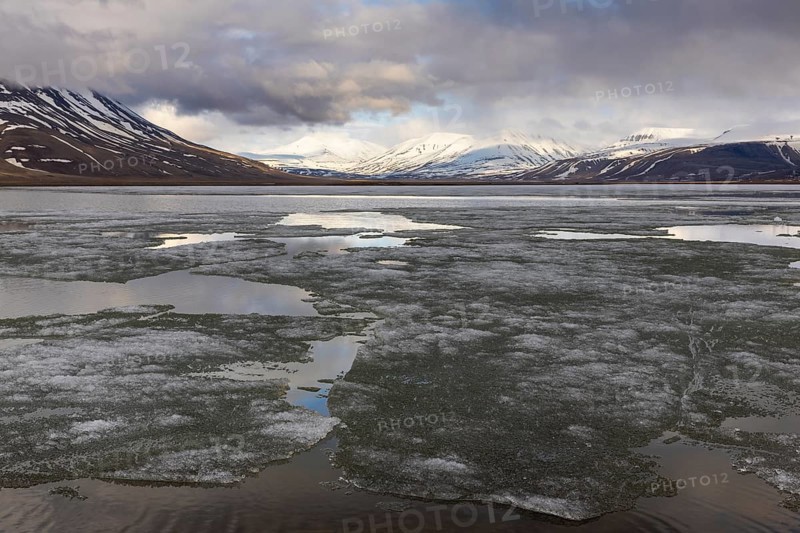 Ice on water, frozen lake, Aventdalen, Longyearbyen, Spitsbergen, Svalbard