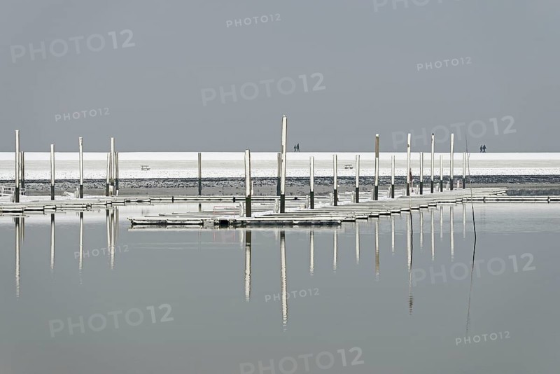 Winter day, onset of winter, snow on the jetties in the marina, North Sea, Norddeich, Lower Saxony, Germany