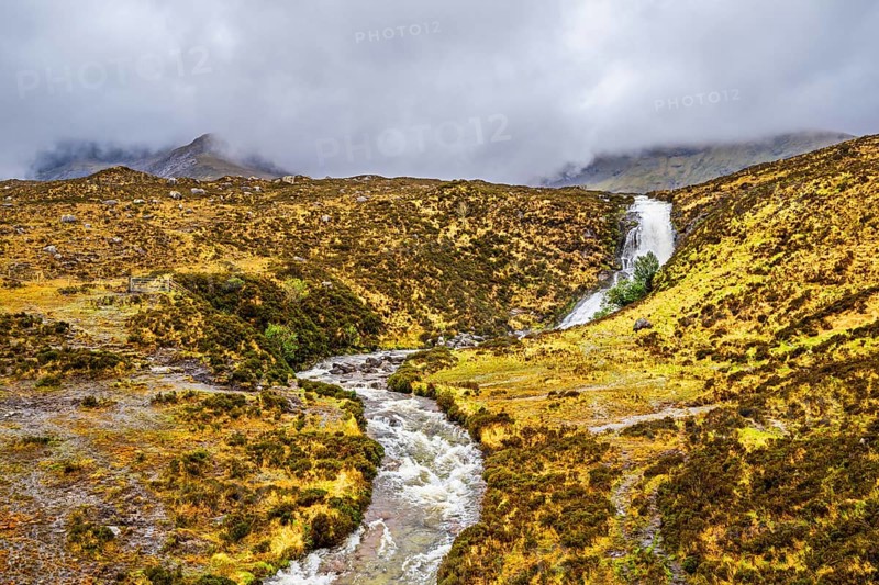 Eas a' Bhradain waterfall, Red Cuillin mountains, Loch Ainort, Isle of Skye, Scotland, UK
