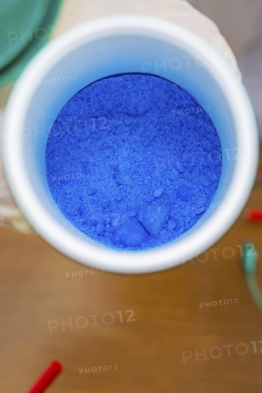 Close-up of a container with blue powder in a laboratory, Battery Research, Nagold, Germany